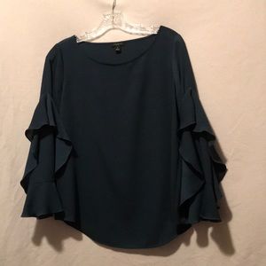 Dark green rayon blouse with flutter sleeves.